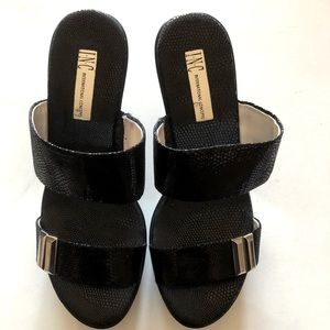 NWB INC Black leather wedge sandals